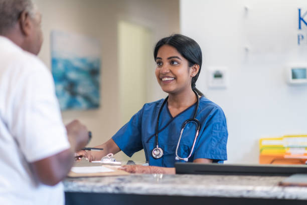 Nurse Assisting Patient